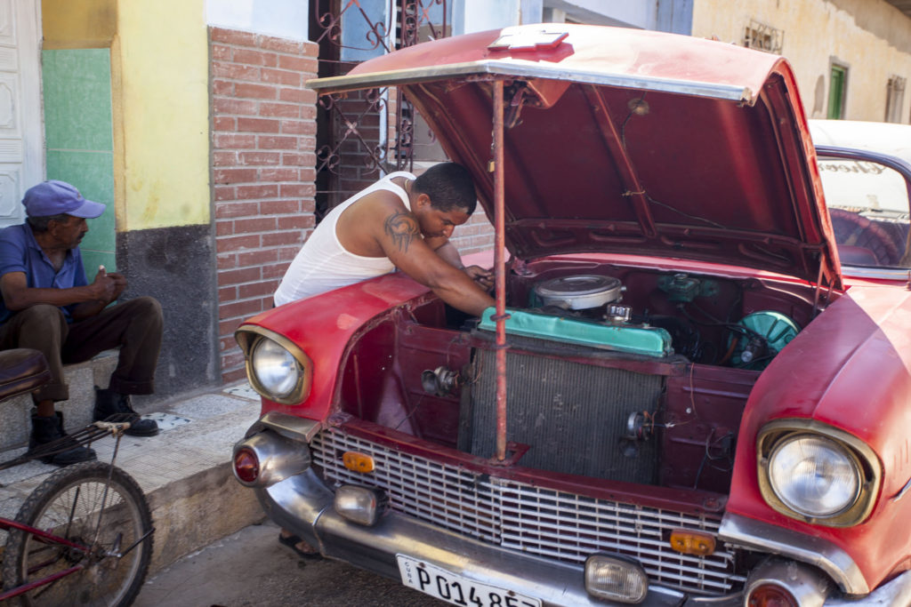 Trinidad - pán spravující auto